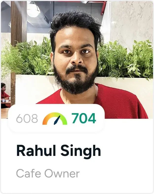 A smiling person with their name, job description and credit score